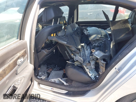 2013 BMW 7 Series 750Li with VIN WBAYE8C50DD133041, listed as a IAAI auction lot 42280002 with Not provided miles and . Bid and sale history available at DreamBid. Image 8.