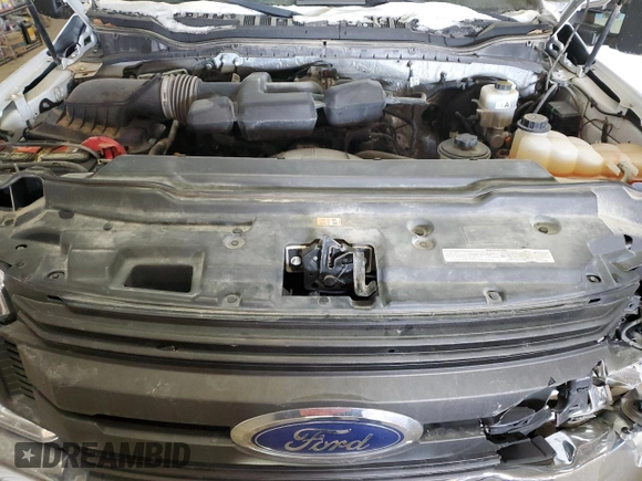 2018 Ford F-250 XL z VIN 1FT7X2A63JED00631, wystawiony jako Copart lot #41529615 z przebiegiem 104 753 mil mil oraz Szkoda całkowita • Salvage title. Historia ofert i sprzedaży dostępna na DreamBid. Obrazek 11.
