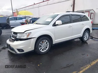2014 Dodge Journey SXT with VIN 3C4PDCBGXET182430, listed as a IAAI auction lot 41599489 with 143,889 mi miles. Bid and sale history available at carsss.com. Image 17.