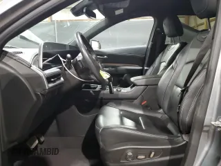 2024 Cadillac XT4 AWD Premium Luxury z VIN 1GYFZDR43RF148662, wystawiony jako Copart lot #65640385 z przebiegiem 38 267 mil mil oraz Czysty tytuł • Clean title. Historia ofert i sprzedaży dostępna na DreamBid. Obrazek 7.