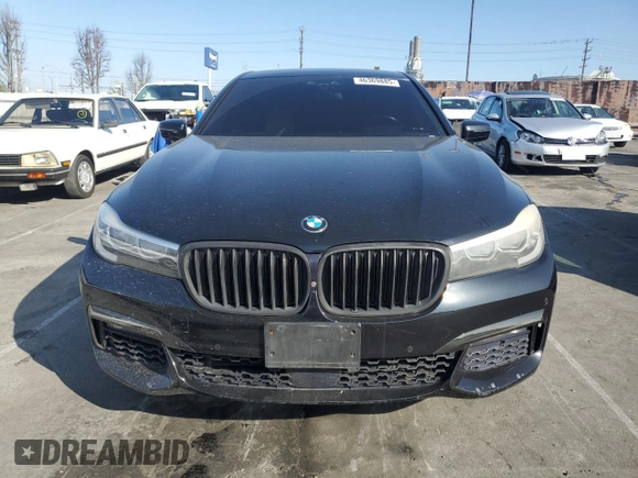 2016 BMW 7 Series 740i с VIN WBA7E2C54GG504200, выставлен на аукционе Copart как лот 46369885 с пробегом 70 606 миль миль и Списание • Salvage title. История ставок и продаж доступна на DreamBid. Изображение 5.