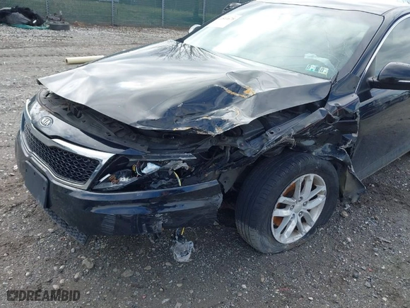 2012 Kia Optima LX with VIN 5XXGM4A7XCG017199, listed as a IAAI auction lot 41811678 with 168,691 mi miles. Bid and sale history available at carsss.com. Image 6.