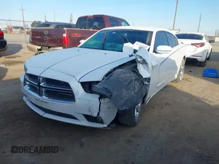 2014 Dodge Charger SE with VIN 2C3CDXBG6EH340877, listed as a IAAI auction lot 41337234 with 181,870 mi miles. Bid and sale history available at carsss.com. Image 2.
