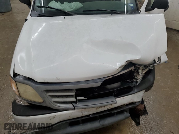 2000 Ford F-150 XL with VIN 1FTRF17L7YNB52822, listed as a Copart auction lot 43421495 with 103,753 mi miles and Salvage title. Bid and sale history available at DreamBid. Image 13.