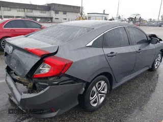 2017 Honda Civic Sedan LX with VIN 19XFC2F68HE212205, listed as a IAAI auction lot 41527843 with 128,401 mi miles. Bid and sale history available at carsss.com. Image 4.