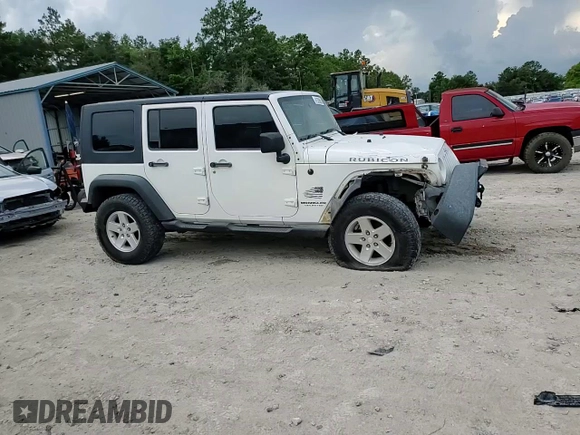 2008 Jeep Wrangler Unlimited Rubicon with VIN 1J8GA69198L547152, listed as a Copart auction lot 61539585 with 158,949 mi miles and Salvage title. Bid and sale history available at DreamBid. Image 14.
