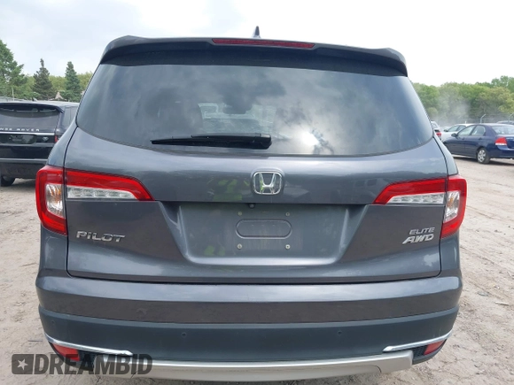 2020 Honda Pilot Elite with VIN 5FNYF6H00LB027472, listed as a IAAI auction lot 42253478 with 69,988 mi miles and . Bid and sale history available at DreamBid. Image 16.