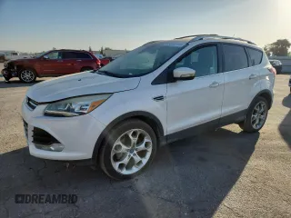2013 Ford Escape Titanium z VIN 1FMCU0J9XDUC15667, wystawiony jako Copart lot #58559765 z przebiegiem 182 851 mil mil oraz Tytuł czysty. Historia ofert i sprzedaży dostępna na DreamBid. Obrazek 1.