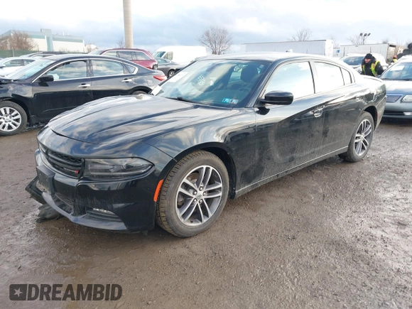 2019 Dodge Charger SXT with VIN 2C3CDXJG3KH630975, listed as a IAAI auction lot 41580174 with 74,575 mi miles and . Bid and sale history available at DreamBid. Image 17.