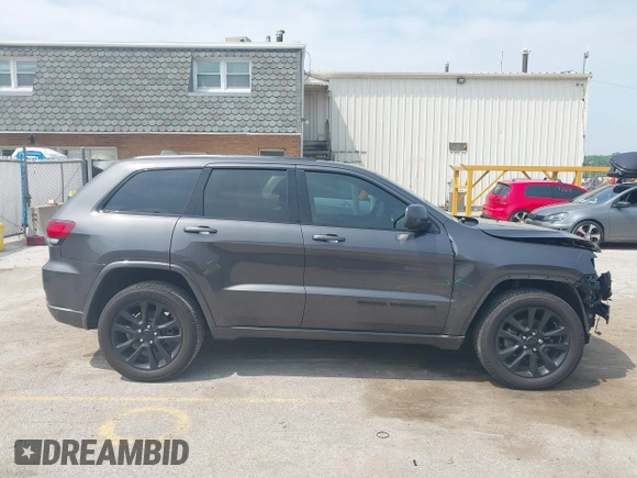 2018 Jeep Grand Cherokee Laredo E with VIN 1C4RJFAG7JC294905, listed as a IAAI auction lot 42452977 with 75,916 mi miles and . Bid and sale history available at DreamBid. Image 13.