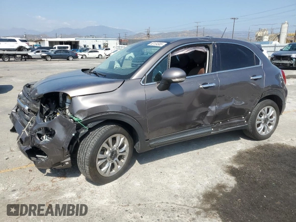 2017 FIAT 500X Lounge with VIN ZFBCFXDB7HP518161, listed as a Copart auction lot 60134985 with 51,357 mi miles and Salvage title. Bid and sale history available at DreamBid. Image 1.