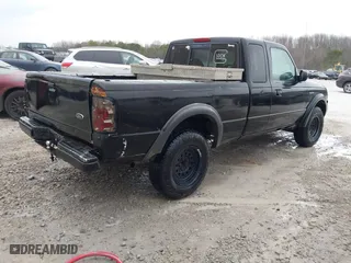 2003 Ford Ranger XL Fleet with VIN 1FTZR45E53TA32809, listed as a IAAI auction lot 41717709 with 186,845 mi miles. Bid and sale history available at carsss.com. Image 4.
