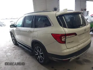 2019 Honda Pilot Elite with VIN 5FNYF6H08KB054725, listed as a IAAI auction lot 40496860 with 91,284 mi miles and . Bid and sale history available at DreamBid. Image 3.