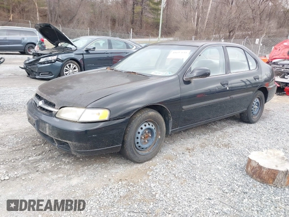 1999 Nissan Altima XE with VIN 1N4DL01DXXC148729, listed as a IAAI auction lot 41697641 with 187,596 mi miles. Bid and sale history available at carsss.com. Image 2.