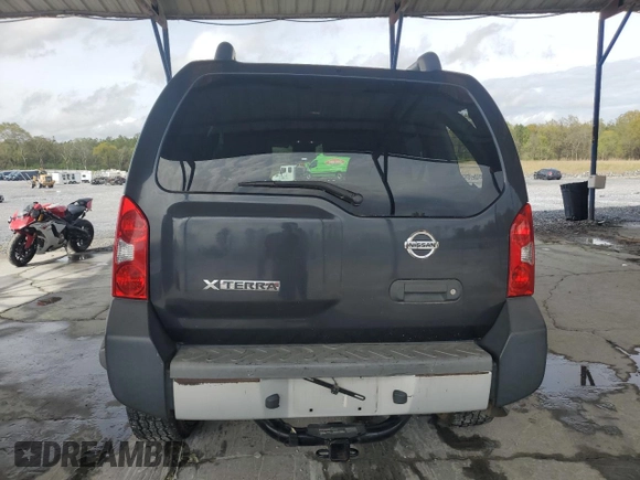 2014 Nissan Xterra X with VIN 5N1AN0NW3EN805368, listed as a Copart auction lot 51140885 with 120,104 mi miles and Salvage Title. Bid and sale history available at DreamBid. Image 6.