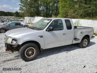 2003 Ford F-150 XL with VIN 1FTRX07W23KC51964, listed as a Copart auction lot 51669715 with 0 mi miles and Salvage Title. Bid and sale history available at carsss.com. Image 1.