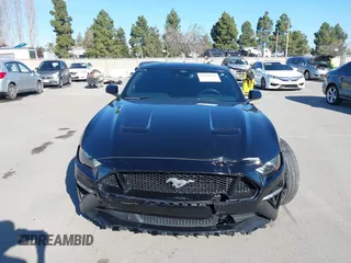 2021 Ford Mustang GT z VIN 1FA6P8CF6M5149175, wystawiony jako IAAI lot #41798328 z przebiegiem 61 776 mil mil oraz . Historia ofert i sprzedaży dostępna na DreamBid. Obrazek 12.