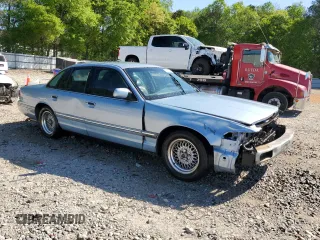 1997 Ford Crown Victoria LX z VIN 2FALP74W1VX218463, wystawiony jako Copart lot #52851045 z przebiegiem 236 098 mil mil oraz Szkoda całkowita • Salvage title. Historia ofert i sprzedaży dostępna na DreamBid. Obrazek 4.