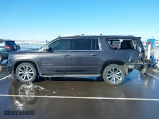 2017 Chevrolet Suburban Premier with VIN 1GNSKJKC0HR274605, listed as a IAAI auction lot 41828392 with 144,747 mi miles. Bid and sale history available at carsss.com. Image 14.