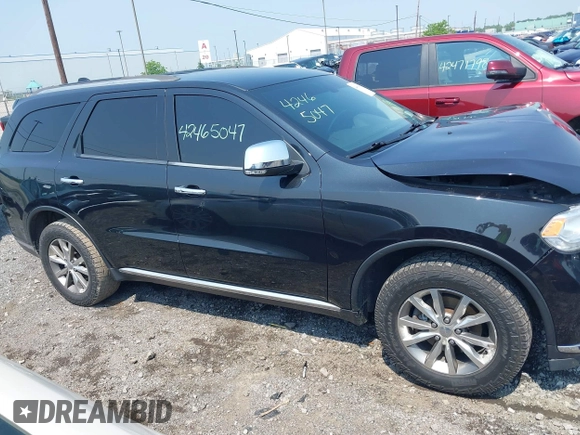 2014 Dodge Durango Limited with VIN 1C4RDJDG5EC532942, listed as a IAAI auction lot 42465047 with 116,617 mi miles and . Bid and sale history available at DreamBid. Image 13.