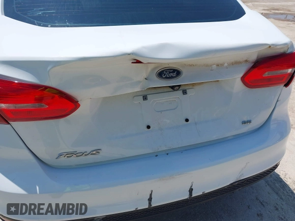 2017 Ford Focus SE with VIN 1FADP3F28HL307889, listed as a IAAI auction lot 42414711 with 169,579 mi miles and . Bid and sale history available at DreamBid. Image 6.
