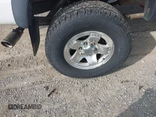 2004 Toyota Tacoma z VIN 5TEWN72N54Z463111, wystawiony jako IAAI lot #42093928 z przebiegiem 147 136 mil mil oraz . Historia ofert i sprzedaży dostępna na DreamBid. Obrazek 12.
