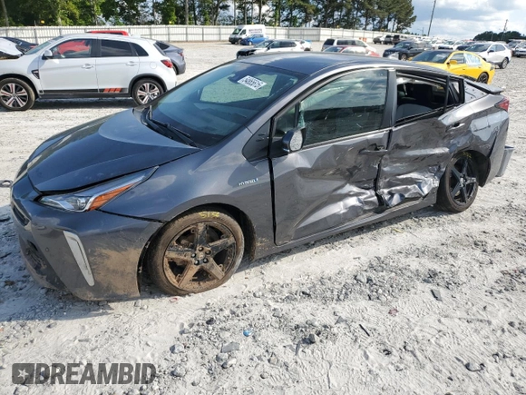 2022 Toyota Prius L Eco z VIN JTDKAMFU8N3173133, wystawiony jako Copart lot #54865615 z przebiegiem 100 876 mil mil oraz Szkoda całkowita • Salvage title. Historia ofert i sprzedaży dostępna na DreamBid. Obrazek 1.