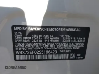 2025 BMW X1 xDrive28i with VIN WBX73EF02S5186420, listed as a IAAI auction lot 41841553 with 1,409 mi miles. Bid and sale history available at carsss.com. Image 9.