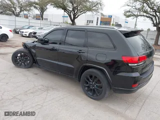 2018 Jeep Grand Cherokee Laredo E with VIN 1C4RJFAG7JC312948, listed as a IAAI auction lot 41624027 with 116,763 mi miles. Bid and sale history available at carsss.com. Image 3.