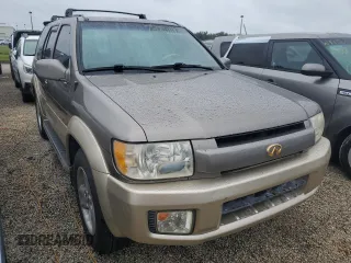 2001 Infiniti QX4 Luxury z VIN JNRDR07X81W103465, wystawiony jako Copart lot #73761114 z przebiegiem 160 676 mil mil oraz Szkody całkowita. Historia ofert i sprzedaży dostępna na DreamBid. Obrazek 4.