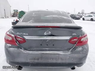 2018 Nissan Altima 2.5 SV with VIN 1N4AL3AP0JC136949, listed as a IAAI auction lot 41572923 with 69,000 mi miles. Bid and sale history available at carsss.com. Image 16.
