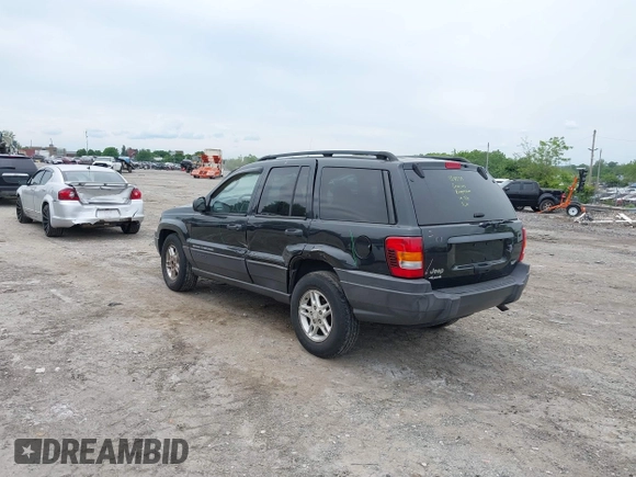 2004 Jeep Grand Cherokee Laredo z VIN 1J4GW48S54C198115, wystawiony jako IAAI lot #42351240 z przebiegiem 189 416 mil mil oraz . Historia ofert i sprzedaży dostępna na DreamBid. Obrazek 3.