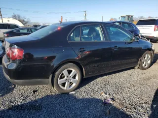2009 Volkswagen Jetta z VIN 3VWHZ71K59M088780, wystawiony jako Copart lot #87115414 z przebiegiem 88 197 mil mil oraz Czysty tytuł • Clean title. Historia ofert i sprzedaży dostępna na DreamBid. Obrazek 3.