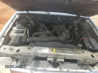 2003 Mazda B-Series Truck DS z VIN 4F4YR16V03TM05710, wystawiony jako Copart lot #54114605 z przebiegiem 187 857 mil mil oraz Szkoda całkowita • Salvage title. Historia ofert i sprzedaży dostępna na DreamBid. Obrazek 11.