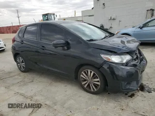 2015 Honda Fit EX-L with VIN 3HGGK5H86FM702976, listed as a Copart auction lot 59439045 with 164,932 mi miles and Salvage title. Bid and sale history available at DreamBid. Image 4.