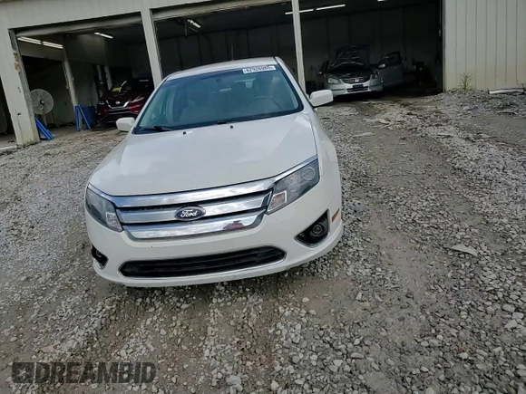 2012 Ford Fusion SEL z VIN 3FAHP0JG9CR164030, wystawiony jako Copart lot #62926985 z przebiegiem 136 043 mil mil oraz Szkoda całkowita • Salvage title. Historia ofert i sprzedaży dostępna na DreamBid. Obrazek 14.