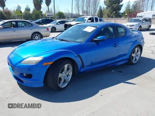 2005 Mazda RX-8 z VIN JM1FE17NX50157626, wystawiony jako IAAI lot #41885669 z przebiegiem 106 835 mil mil oraz . Historia ofert i sprzedaży dostępna na DreamBid. Obrazek 2.