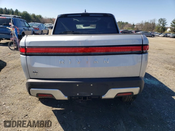 2023 Rivian R1T Adventure with VIN 7FCTGBAA8PN027711, listed as a Copart auction lot 49449155 with 16,031 mi miles and Salvage Title. Bid and sale history available at carsss.com. Image 6.