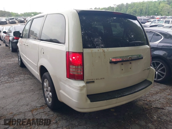 2009 Chrysler Town & Country LX with VIN 2A8HR44E39R606779, listed as a IAAI auction lot 42059256 with 177,228 mi miles and . Bid and sale history available at DreamBid. Image 3.