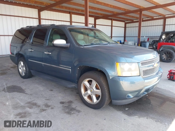 2009 Chevrolet Suburban LTZ with VIN 1GNFC36J29R293712, listed as a IAAI auction lot 42577800 with 202,593 mi miles and . Bid and sale history available at DreamBid. Image 1.