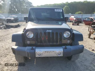 2015 Jeep Wrangler Unlimited Sahara with VIN 1C4HJWEGXFL744852, listed as a Copart auction lot 60246145 with 135,496 mi miles and Salvage title. Bid and sale history available at DreamBid. Image 5.