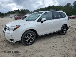 2015 Subaru Forester XT Touring with VIN JF2SJGUCXFH820469, listed as a Copart auction lot 62777665 with 90,389 mi miles and Salvage title. Bid and sale history available at DreamBid. Image 1.