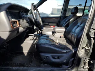 1997 Jeep Grand Cherokee Limited with VIN 1J4GZ78Y1VC563890, listed as a Copart auction lot 41910925 with 0 mi miles and Clean Title. Bid and sale history available at carsss.com. Image 7.