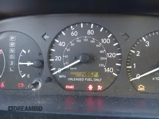1999 Toyota Camry LE z VIN 4T1BF28K3XU931485, wystawiony jako IAAI lot #41413709 z przebiegiem 148 621 mil mil oraz . Historia ofert i sprzedaży dostępna na DreamBid. Obrazek 7.