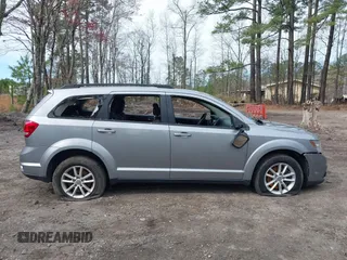 2015 Dodge Journey SXT with VIN 3C4PDCBG5FT696882, listed as a IAAI auction lot 41848362 with 175,039 mi miles and . Bid and sale history available at DreamBid. Image 13.