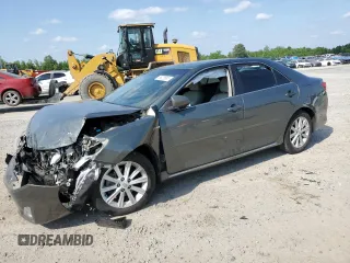 2012 Toyota Camry XLE z VIN 4T1BD1FK4CU023043, wystawiony jako Copart lot #55220885 z przebiegiem Nie podano mil oraz Szkoda całkowita • Salvage title. Historia ofert i sprzedaży dostępna na DreamBid. Obrazek 1.