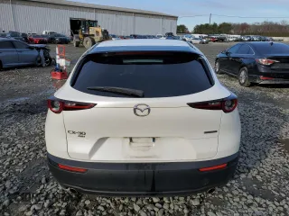 2021 Mazda CX-30 Preferred z VIN 3MVDMBCLXMM222277, wystawiony jako Copart lot #82465924 z przebiegiem 90 863 mil mil oraz Szkoda całkowita • Salvage title. Historia ofert i sprzedaży dostępna na DreamBid. Obrazek 6.