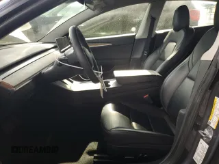 2023 Tesla Model 3 with VIN 5YJ3E1EA0PF449499, listed as a Copart auction lot 52900515 with 42,706 mi miles and Non Repairable. Bid and sale history available at DreamBid. Image 7.