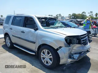 2013 Honda Pilot LX with VIN 5FNYF3H27DB014882, listed as a IAAI auction lot 42783440 with 118,072 mi miles and . Bid and sale history available at DreamBid. Image 1.