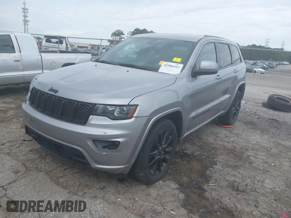 2018 Jeep Grand Cherokee Laredo E z VIN 1C4RJEAG5JC404022, wystawiony jako IAAI lot #42586412 z przebiegiem 95 798 mil mil oraz . Historia ofert i sprzedaży dostępna na DreamBid. Obrazek 2.